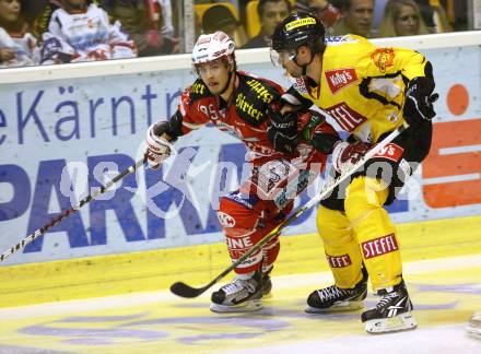 EBEL. Eishockey Bundesliga.  KAC gegen UPC Vienna Capitals. HERBURGER Raphael (KAC), LAKOS Philippe (Caps). Klagenfurt, 7.10.2011.
Foto: Kuess 

---
pressefotos, pressefotografie, kuess, qs, qspictures, sport, bild, bilder, bilddatenbank