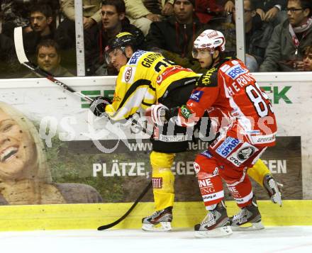 EBEL. Eishockey Bundesliga.  KAC gegen UPC Vienna Capitals. HERBURGER Raphael (KAC), GRATTON Benoit (Caps). Klagenfurt, 7.10.2011.
Foto: Kuess 

---
pressefotos, pressefotografie, kuess, qs, qspictures, sport, bild, bilder, bilddatenbank