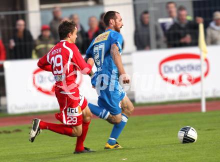 Fussball Regionalliga. VSV gegen GAK. Rok Pavlicic, (VSV), Michael Hofer  (GAK). Villach, 8.10.2011.
Foto: Kuess
---
pressefotos, pressefotografie, kuess, qs, qspictures, sport, bild, bilder, bilddatenbank