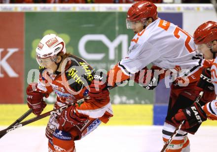 EBEL. Eishockey Bundesliga. KAC gegen HK Acroni Jesenice. Tyler Scofield, (KAC), Marcus Olsson (Jesenice). Klagenfurt, am 14.10.2011.
Foto: Kuess

---
pressefotos, pressefotografie, kuess, qs, qspictures, sport, bild, bilder, bilddatenbank