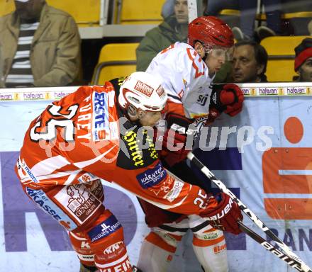EBEL. Eishockey Bundesliga. KAC gegen HK Acroni Jesenice. Kirk Furey, (KAC), James Sixsmith (Jesenice). Klagenfurt, am 14.10.2011.
Foto: Kuess

---
pressefotos, pressefotografie, kuess, qs, qspictures, sport, bild, bilder, bilddatenbank