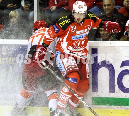 EBEL. Eishockey Bundesliga. KAC gegen HK Acroni Jesenice. Christoph Brandner,  (KAC), Jan Bercic (Jesenice). Klagenfurt, am 14.10.2011.
Foto: Kuess

---
pressefotos, pressefotografie, kuess, qs, qspictures, sport, bild, bilder, bilddatenbank