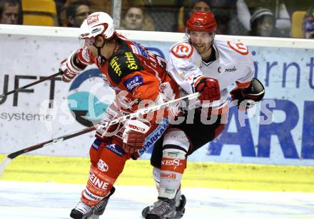 EBEL. Eishockey Bundesliga. KAC gegen HK Acroni Jesenice. John Lammers,  (KAC), Andrej Tavzelj (Jesenice). Klagenfurt, am 14.10.2011.
Foto: Kuess

---
pressefotos, pressefotografie, kuess, qs, qspictures, sport, bild, bilder, bilddatenbank