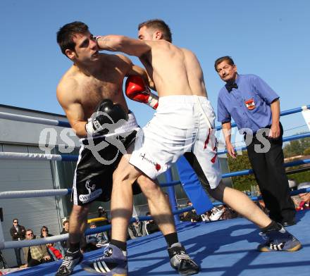 Boxen. Profiwettkampf. Dejan Milicevic (schwarze Handschuhe) gegen Ivan Vladimir (rote Handschuhe). Klagenfurt, am 16.10.2011.
Foto: Kuess
---
pressefotos, pressefotografie, kuess, qs, qspictures, sport, bild, bilder, bilddatenbank