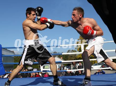 Boxen. Profiwettkampf. Dejan Milicevic (schwarze Handschuhe) gegen Ivan Vladimir (rote Handschuhe). Klagenfurt, am 16.10.2011.
Foto: Kuess
---
pressefotos, pressefotografie, kuess, qs, qspictures, sport, bild, bilder, bilddatenbank