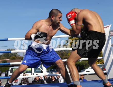 Boxen. Profiwettkaempfe. Ando Sarkisian (schwarze Handschuhe), Ante Silgeg (rote Handschuhe). Klagenfurt, am 16.10.2011.
Foto: Kuess
---
pressefotos, pressefotografie, kuess, qs, qspictures, sport, bild, bilder, bilddatenbank