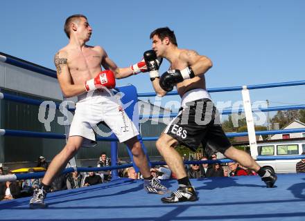 Boxen. Profiwettkampf. Dejan Milicevic (schwarze Handschuhe) gegen Ivan Vladimir (rote Handschuhe). Klagenfurt, am 16.10.2011.
Foto: Kuess
---
pressefotos, pressefotografie, kuess, qs, qspictures, sport, bild, bilder, bilddatenbank