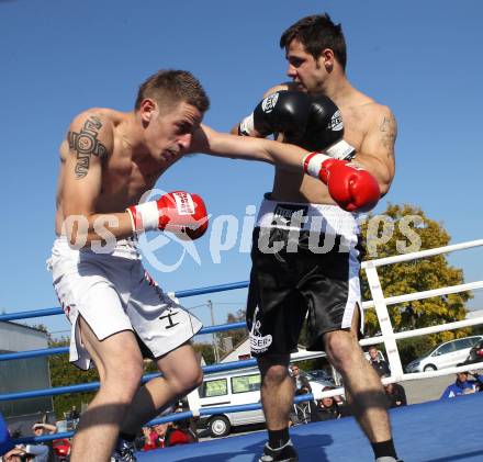 Boxen. Profiwettkampf. Dejan Milicevic (schwarze Handschuhe) gegen Ivan Vladimir (rote Handschuhe). Klagenfurt, am 16.10.2011.
Foto: Kuess
---
pressefotos, pressefotografie, kuess, qs, qspictures, sport, bild, bilder, bilddatenbank