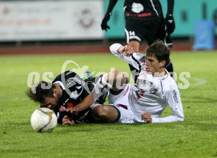 Fussball. Erste Liga. RZ Pellets WAC/St. Andrae gegen TSV Sparkasse Hartberg. Falk Christian (WAC), Adilovic Edmir Edo (Hartberg). Wolfsberg, 21.10.2011. 
Foto: Kuess

---
pressefotos, pressefotografie, kuess, qs, qspictures, sport, bild, bilder, bilddatenbank