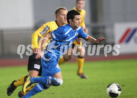 Fussball Regionalliga. VSV gegen Voecklamarkt. Denis Curic (VSV), Christian Aichinger (Voecklamarkt). Villach, am 22.10.2011.
Foto: Kuess
---
pressefotos, pressefotografie, kuess, qs, qspictures, sport, bild, bilder, bilddatenbank