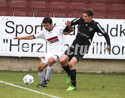 Fussball. Kaerntner Liga. Feldkirchen gegen ATUS Ferlach. Auron Miloti (Feldkirchen), Markus Dixer (Ferlach). Feldkirchen, am 22.10.2011.
Foto: Kuess 
---
pressefotos, pressefotografie, kuess, qs, qspictures, sport, bild, bilder, bilddatenbank