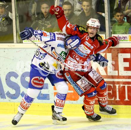 EBEL. Eishockey Bundesliga. KAC gegen VSV. Thomas HUndertpfund, (KAC), Greg Kuznik (VSV). Klagenfurt, am 25.10.2011.
Foto: Kuess

---
pressefotos, pressefotografie, kuess, qs, qspictures, sport, bild, bilder, bilddatenbank