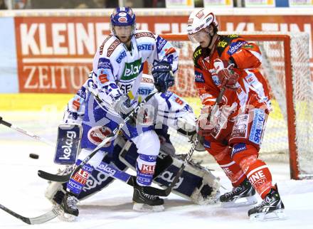 EBEL. Eishockey Bundesliga. KAC gegen VSV. Paul Schellander, (KAC), Christof Martinz (VSV). Klagenfurt, am 25.10.2011.
Foto: Kuess

---
pressefotos, pressefotografie, kuess, qs, qspictures, sport, bild, bilder, bilddatenbank