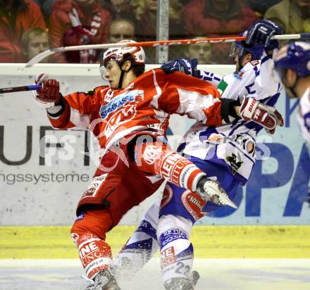 EBEL. Eishockey Bundesliga. KAC gegen VSV. Raphael Herburger, (KAC), Greg Kuznik (VSV). Klagenfurt, am 25.10.2011.
Foto: Kuess

---
pressefotos, pressefotografie, kuess, qs, qspictures, sport, bild, bilder, bilddatenbank