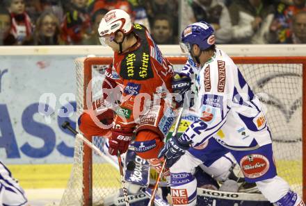 EBEL. Eishockey Bundesliga. KAC gegen VSV. John Lammers, (KAC), Greg Kuznik (VSV). Klagenfurt, am 25.10.2011.
Foto: Kuess

---
pressefotos, pressefotografie, kuess, qs, qspictures, sport, bild, bilder, bilddatenbank