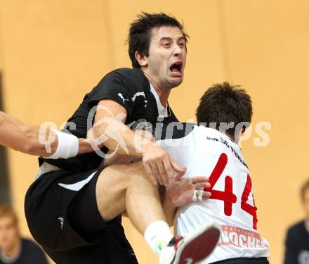 Handball Bundesliga. SC Ferlach gegen HCK 59. Miha Dobnik (Ferlach), Josip Pecina (HCK). Ferlach, 29.10.2011.
Foto: Kuess
---
pressefotos, pressefotografie, kuess, qs, qspictures, sport, bild, bilder, bilddatenbank