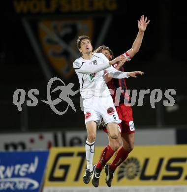 Fussball. Erste Liga. RZ Pellets WAC/St. Andrae gegen  LASK. Christian Falk, (WAC), Rene Aufhauser (LASK). Wolfsberg, 4.11.2010. 
Foto: Kuess

---
pressefotos, pressefotografie, kuess, qs, qspictures, sport, bild, bilder, bilddatenbank