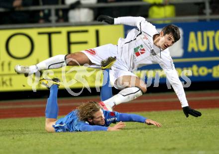 Fussball. Erste Liga. RZ Pellets WAC/St. Andrae gegen SV Groedig. Mihret Topcagic, (WAC),  Sebastian Siller (Groedig). Wolfsberg, 25.11.2011. 
Foto: Kuess

---
pressefotos, pressefotografie, kuess, qs, qspictures, sport, bild, bilder, bilddatenbank