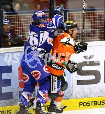 EBEL. Eishockey Bundesliga. EC Rekord Fenster VSV gegen Moser Medical Graz 99ers. MARTINZ Christof (VSV), JARRETT Rodney (Graz). Villach, am 25.11.2011.
Foto: Kuess 


---
pressefotos, pressefotografie, kuess, qs, qspictures, sport, bild, bilder, bilddatenbank