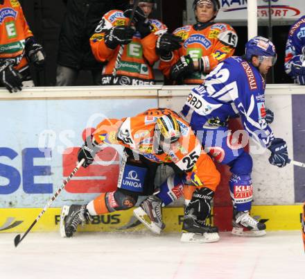 EBEL. Eishockey Bundesliga. EC Rekord Fenster VSV gegen Moser Medical Graz 99ers. KUZNIK Greg (VSV), BUSQUE Yvan (Graz). Villach, am 25.11.2011.
Foto: Kuess 


---
pressefotos, pressefotografie, kuess, qs, qspictures, sport, bild, bilder, bilddatenbank