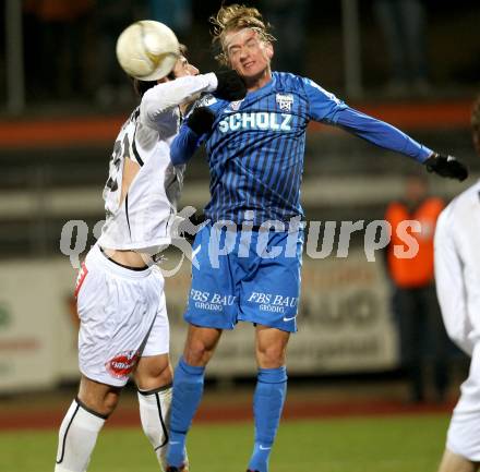 Fussball. Erste Liga. RZ Pellets WAC/St. Andrae gegen SV Groedig. Mihret Topcagic, (WAC), Lukas Schubert (Groedig). Wolfsberg, 25.11.2011. 
Foto: Kuess

---
pressefotos, pressefotografie, kuess, qs, qspictures, sport, bild, bilder, bilddatenbank