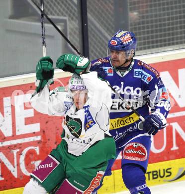 EBEL. Eishockey Bundesliga. VSV gegen HDD TILIA Olimpija Ljubljana. Shayne Toporowski  (VSV), Jamie Fraser (Laibach). Klagenfurt, am 4.12.2011.
Foto: Kuess

---
pressefotos, pressefotografie, kuess, qs, qspictures, sport, bild, bilder, bilddatenbank