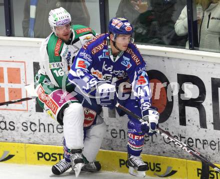 EBEL. Eishockey Bundesliga. VSV gegen HDD TILIA Olimpija Ljubljana. Mario Altmann  (VSV), Ales Music (Laibach). Klagenfurt, am 4.12.2011.
Foto: Kuess

---
pressefotos, pressefotografie, kuess, qs, qspictures, sport, bild, bilder, bilddatenbank