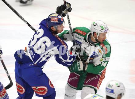 EBEL. Eishockey Bundesliga. VSV gegen HDD TILIA Olimpija Ljubljana. Marco Pewal (VSV), Matej Hocevar (Laibach). Klagenfurt, am 4.12.2011.
Foto: Kuess

---
pressefotos, pressefotografie, kuess, qs, qspictures, sport, bild, bilder, bilddatenbank