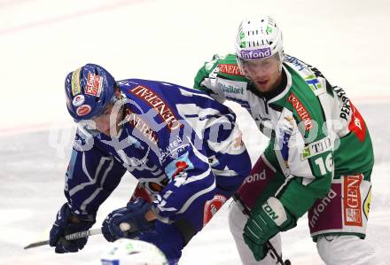 EBEL. Eishockey Bundesliga. VSV gegen HDD TILIA Olimpija Ljubljana. Kyle Wanvig  (VSV), Ales Music (Laibach). Klagenfurt, am 4.12.2011.
Foto: Kuess

---
pressefotos, pressefotografie, kuess, qs, qspictures, sport, bild, bilder, bilddatenbank