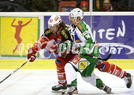 EBEL. Eishockey Bundesliga. KAC gegen HDD TILIA Olimpija Ljubljana. HUNDERTPFUND Thomas (KAC), MUSIC Ales (Laibach). Klagenfurt, am 6.12.2011.
Foto: Kuess

---
pressefotos, pressefotografie, kuess, qs, qspictures, sport, bild, bilder, bilddatenbank