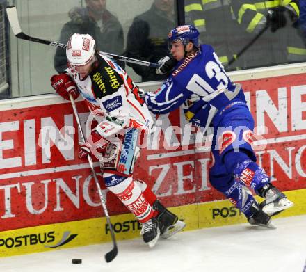 EBEL. Eishockey Bundesliga. EC Rekord Fenster VSV gegen KAC.  PEWAL Marco (VSV),  HUNDERTPFUND Thomas (KAC). Villach, am 9.12.2011.
Foto: Kuess 


---
pressefotos, pressefotografie, kuess, qs, qspictures, sport, bild, bilder, bilddatenbank