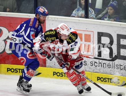 EBEL. Eishockey Bundesliga. EC Rekord Fenster VSV gegen KAC. Gerhard Unterluggauer,  (VSV), John Lammers (KAC). Villach, am 9.12.2011.
Foto: Kuess 


---
pressefotos, pressefotografie, kuess, qs, qspictures, sport, bild, bilder, bilddatenbank