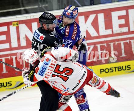 EBEL. Eishockey Bundesliga. EC Rekord Fenster VSV gegen KAC. Kyle Wanvig,  (VSV), Paul Schellander (KAC). Villach, am 9.12.2011.
Foto: Kuess 


---
pressefotos, pressefotografie, kuess, qs, qspictures, sport, bild, bilder, bilddatenbank