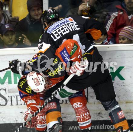 EBEL. Eishockey Bundesliga. KAC gegen Moser Medical Graz 99ers. Herbert Ratz, (KAC), Guillaume Lefevre  (Graz). Klagenfurt, am 11.12.2011.
Foto: Kuess

---
pressefotos, pressefotografie, kuess, qs, qspictures, sport, bild, bilder, bilddatenbank