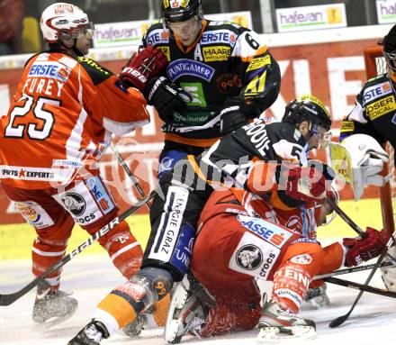 EBEL. Eishockey Bundesliga. KAC gegen Moser Medical Graz 99ers. Kirk Furey, John Lammers, (KAC), Toni Dahlman, Dustin Van Ballegooie (Graz). Klagenfurt, am 11.12.2011.
Foto: Kuess

---
pressefotos, pressefotografie, kuess, qs, qspictures, sport, bild, bilder, bilddatenbank