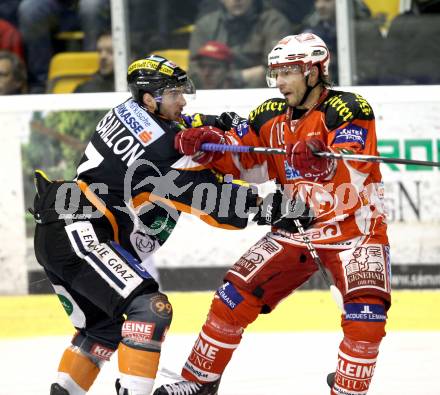 EBEL. Eishockey Bundesliga. KAC gegen Moser Medical Graz 99ers. Thomas Koch (KAC), Sebastien Bisaillon (Graz). Klagenfurt, am 11.12.2011.
Foto: Kuess

---
pressefotos, pressefotografie, kuess, qs, qspictures, sport, bild, bilder, bilddatenbank