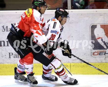 Eishockey Oesterreich Cup. Oesterreich gegen Schweiz. Daniel Welser,  (Oesterreich), Inti Pestoni (Schweiz). Klagenfurt, 16.12.2011.
Foto: Kuess

---
pressefotos, pressefotografie, kuess, qs, qspictures, sport, bild, bilder, bilddatenbank