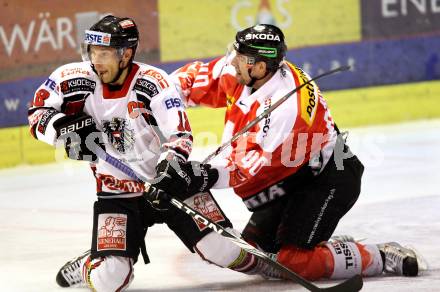 Eishockey Oesterreich Cup. Oesterreich gegen Schweiz. Thomas Koch, (Oesterreich), Daniel Rubin  (Schweiz). Klagenfurt, 16.12.2011.
Foto: Kuess

---
pressefotos, pressefotografie, kuess, qs, qspictures, sport, bild, bilder, bilddatenbank