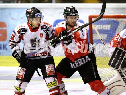 Eishockey Oesterreich Cup. Oesterreich gegen Schweiz. Thomas Koch,  (Oesterreich), Morris Trachsler (Schweiz). Klagenfurt, 16.12.2011.
Foto: Kuess

---
pressefotos, pressefotografie, kuess, qs, qspictures, sport, bild, bilder, bilddatenbank