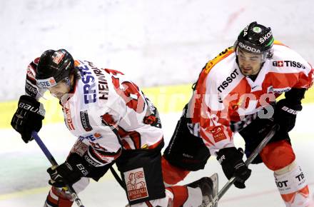 Eishockey Oesterreich Cup. Oesterreich gegen Schweiz.  Dominique Heinrich, (Oesterreich), Andreas Ambuehl  (Schweiz). Klagenfurt, 16.12.2011.
Foto: Kuess

---
pressefotos, pressefotografie, kuess, qs, qspictures, sport, bild, bilder, bilddatenbank