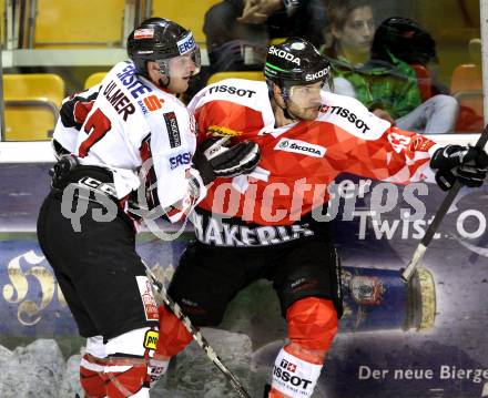 Eishockey Oesterreich Cup. Oesterreich gegen Schweiz.  Stefan Ulmer, (Oesterreich), Morris Trachsler (Schweiz). Klagenfurt, 16.12.2011.
Foto: Kuess

---
pressefotos, pressefotografie, kuess, qs, qspictures, sport, bild, bilder, bilddatenbank