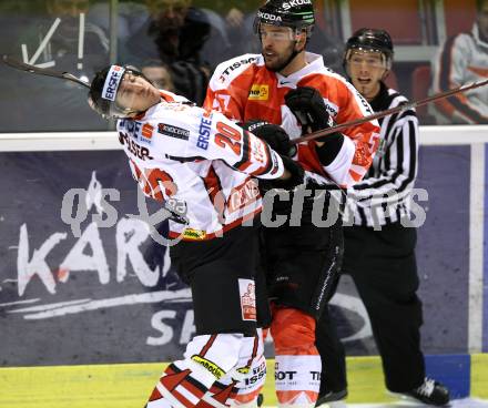 Eishockey Oesterreich Cup. Oesterreich gegen Schweiz. Daniel Welser,  (Oesterreich), Goran Bezina (Schweiz). Klagenfurt, 16.12.2011.
Foto: Kuess

---
pressefotos, pressefotografie, kuess, qs, qspictures, sport, bild, bilder, bilddatenbank