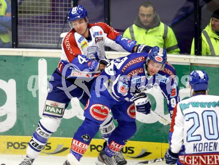 EBEL. Eishockey Bundesliga. EC Rekord Fenster VSV gegen KHL Medvescak Zagreb. Tomaz Razingar,  (VSV), Sasha Pokulok (Zagreb). Villach, am 20.12.2011.
Foto: Kuess 


---
pressefotos, pressefotografie, kuess, qs, qspictures, sport, bild, bilder, bilddatenbank