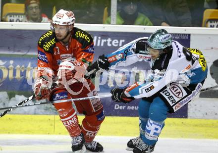 EBEL. Eishockey Bundesliga. KAC gegen EHC LIWEST Linz. Johannes Kirisits,  (KAC), Martin Mairitsch (Linz). Klagenfurt, am 26.12.2011.
Foto: Kuess

---
pressefotos, pressefotografie, kuess, qs, qspictures, sport, bild, bilder, bilddatenbank