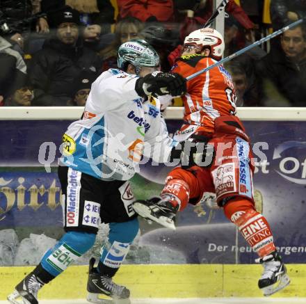 EBEL. Eishockey Bundesliga. KAC gegen EHC LIWEST Linz. Joseph Joey Tenute,  (KAC), Justin Keller (Linz). Klagenfurt, am 26.12.2011.
Foto: Kuess

---
pressefotos, pressefotografie, kuess, qs, qspictures, sport, bild, bilder, bilddatenbank