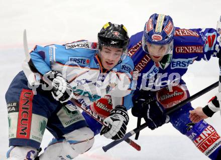 EBEL. Eishockey Bundesliga. EC Rekord Fenster VSV gegen SAPA Fehervar AV19. Derek Damon,  (VSV), Derek Ryan (Alba Volan). Villach, am 1.1.2012.
Foto: Kuess 


---
pressefotos, pressefotografie, kuess, qs, qspictures, sport, bild, bilder, bilddatenbank