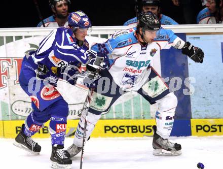 EBEL. Eishockey Bundesliga. EC Rekord Fenster VSV gegen SAPA Fehervar AV19. Stefan Bacher, (VSV),   Arpas Mihaly (Alba Volan). Villach, am 1.1.2012.
Foto: Kuess 


---
pressefotos, pressefotografie, kuess, qs, qspictures, sport, bild, bilder, bilddatenbank