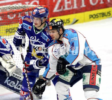 EBEL. Eishockey Bundesliga. EC Rekord Fenster VSV gegen SAPA Fehervar AV19. Stefan Bacher,  (VSV), Andras Horvath (Alba Volan). Villach, am 1.1.2012.
Foto: Kuess 


---
pressefotos, pressefotografie, kuess, qs, qspictures, sport, bild, bilder, bilddatenbank