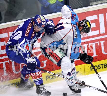 EBEL. Eishockey Bundesliga. EC Rekord Fenster VSV gegen SAPA Fehervar AV19. Michael Koefeler,  (VSV), Harlan Pratt (Alba Volan). Villach, am 1.1.2012.
Foto: Kuess 


---
pressefotos, pressefotografie, kuess, qs, qspictures, sport, bild, bilder, bilddatenbank