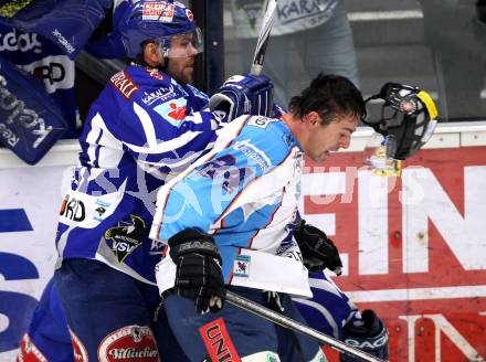 EBEL. Eishockey Bundesliga. EC Rekord Fenster VSV gegen SAPA Fehervar AV19. Kevin Mitchell,  (VSV), Krisztian Palkovics (Alba Volan). Villach, am 1.1.2012.
Foto: Kuess 


---
pressefotos, pressefotografie, kuess, qs, qspictures, sport, bild, bilder, bilddatenbank